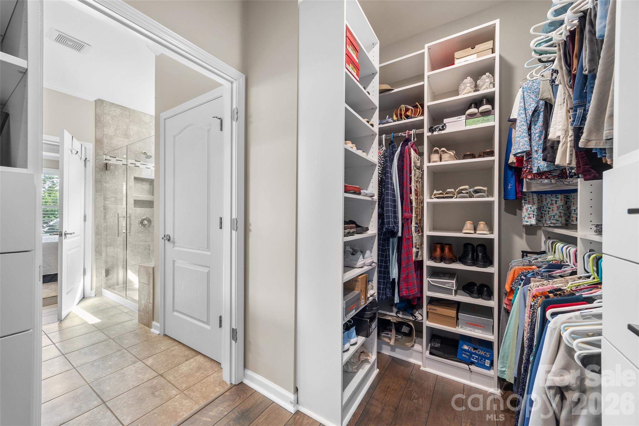 836 Bliss Drive Fort Mill, SC 29715 - Photo 27 of 47 a view of walk in closet with clothes and shoes