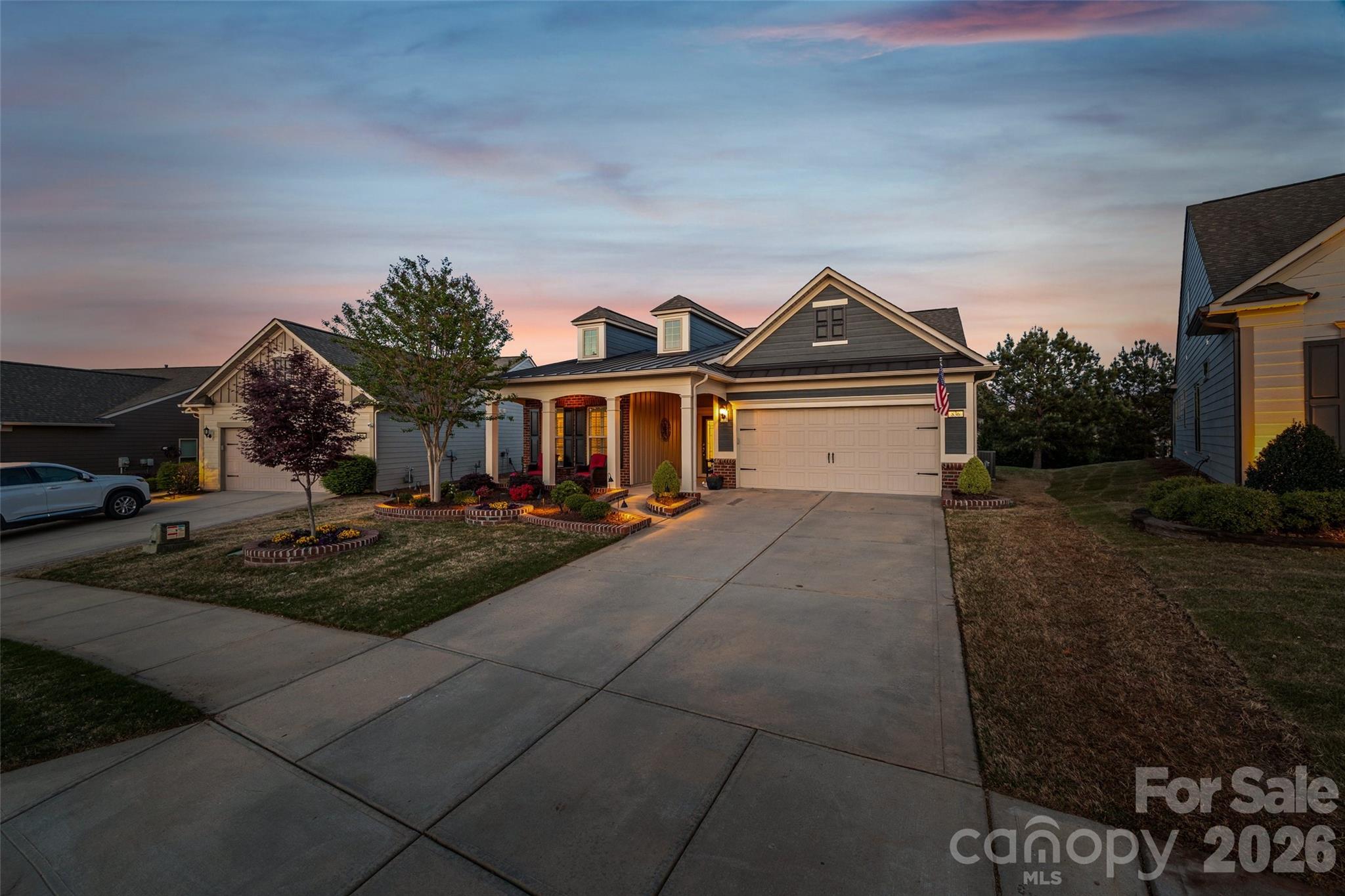 836 Bliss Drive Fort Mill, SC 29715 - Photo 3 of 47 a front view of a house with garden