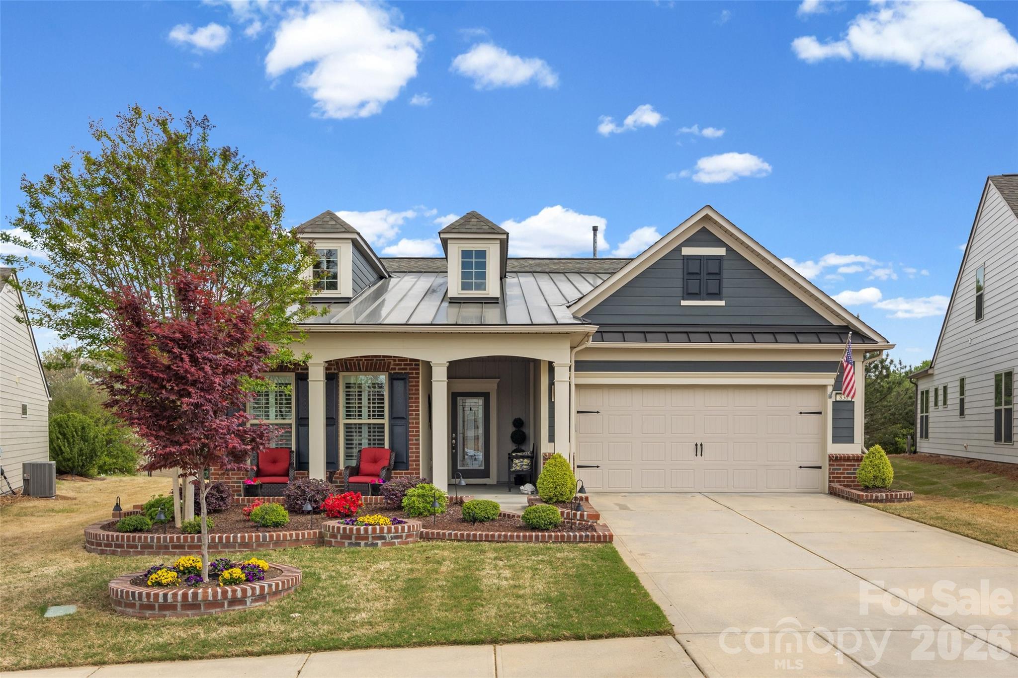 836 Bliss Drive Fort Mill, SC 29715 - Photo 4 of 47 a front view of a house with garden
