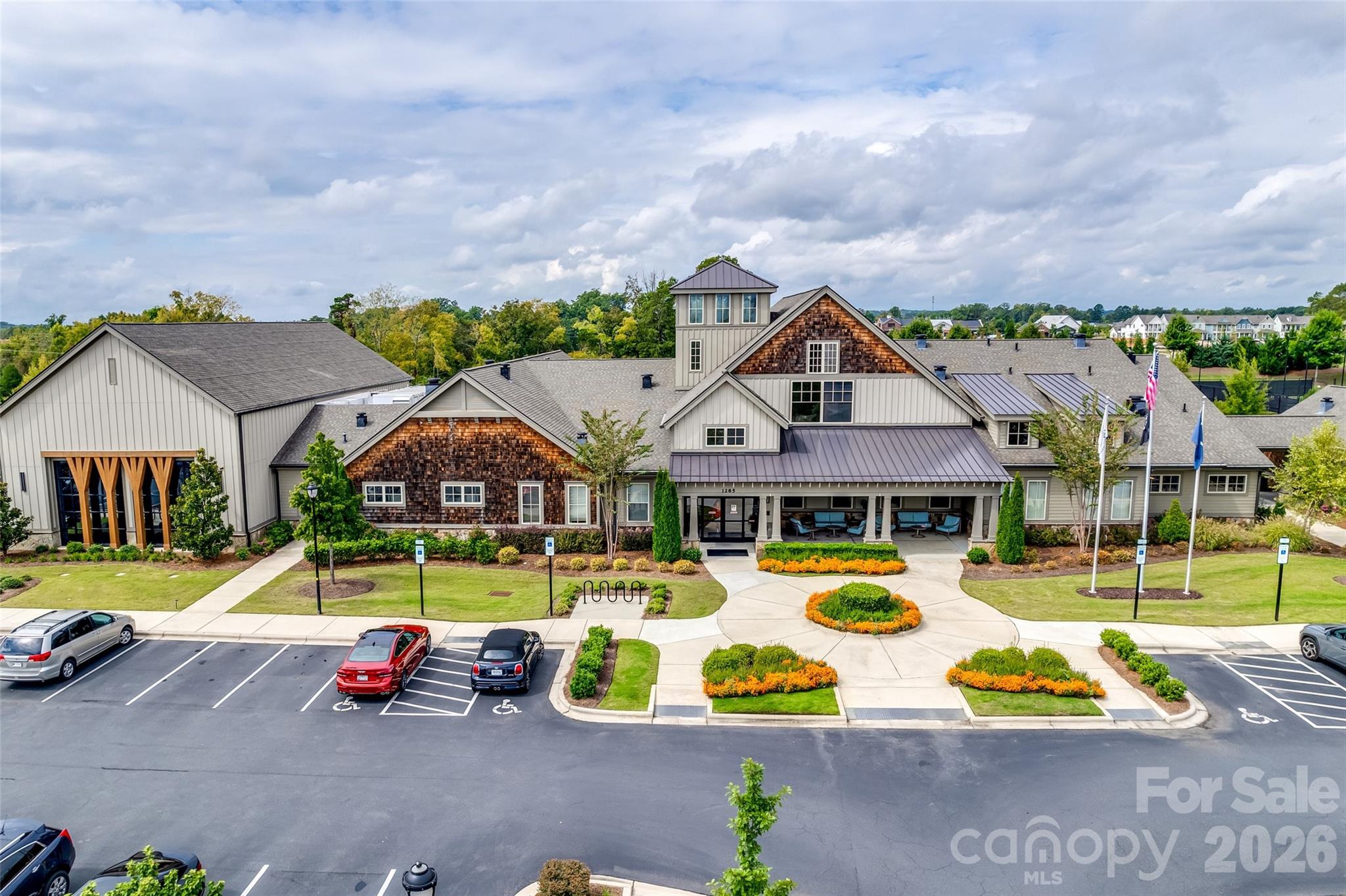 836 Bliss Drive Fort Mill, SC 29715 - Photo 41 of 47 an aerial view of a house with swimming pool and glass top table and chairs