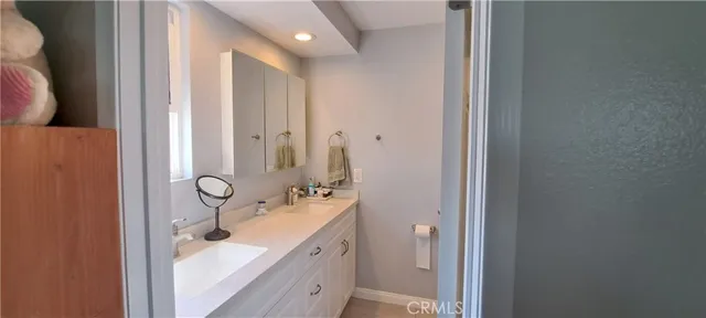a bathroom with a shower and toilet