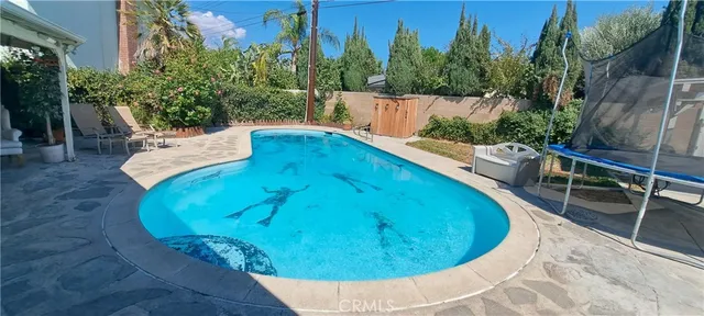 a view of a house with a swimming pool