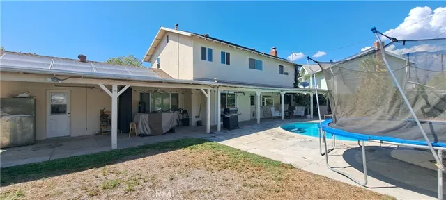 a lobby with furniture and floor to ceiling window