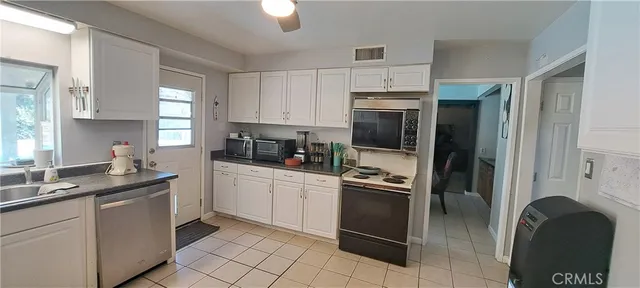 a view of a living room and bathroom