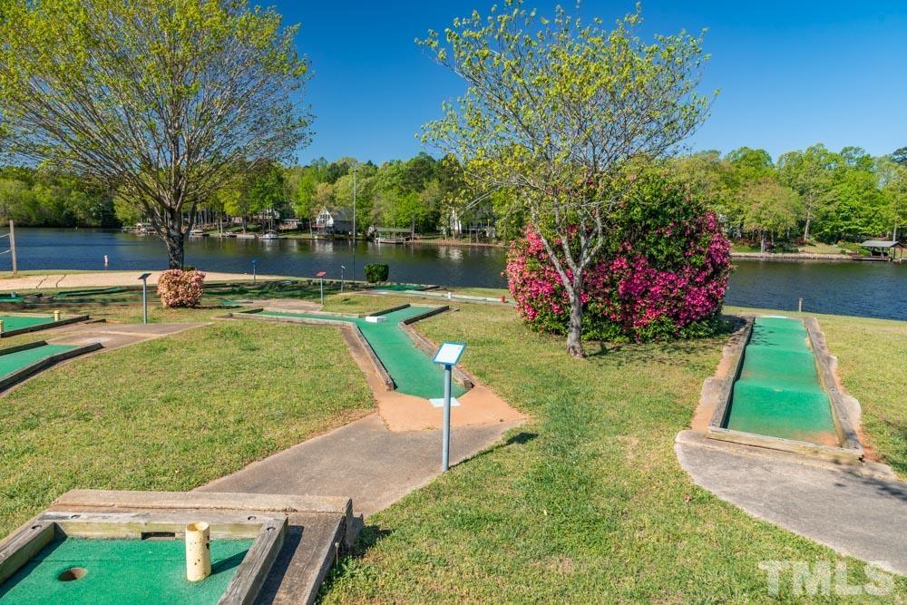 108 Manhato Drive Spring Hope, NC 27882 - Photo 8 of 15 a view of a backyard with swimming pool