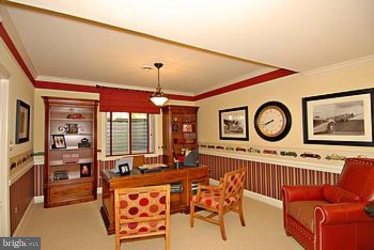 502 Broad Stream Lane Riva, MD 21140 - Photo 22 of 30 a living room with furniture a table and a chandelier