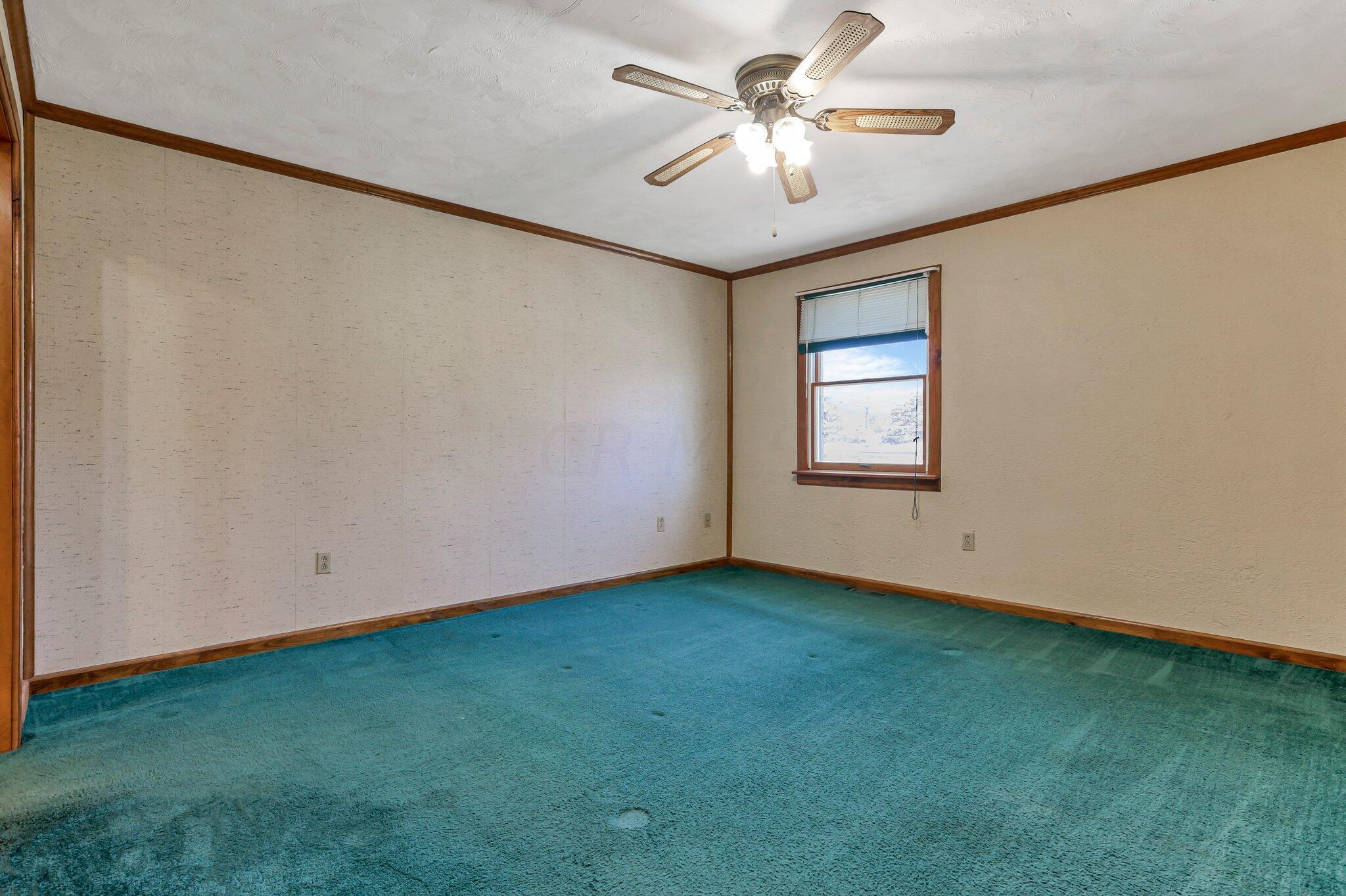 5225 Deeds Road Southwest Pataskala, OH 43062 - Photo 15 of 43 1st floor owner's bedroom
