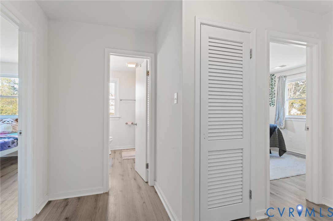 7547 Media Park Road Henrico, VA 23231 - Photo 13 of 24 a view of a bathroom from the hallway
