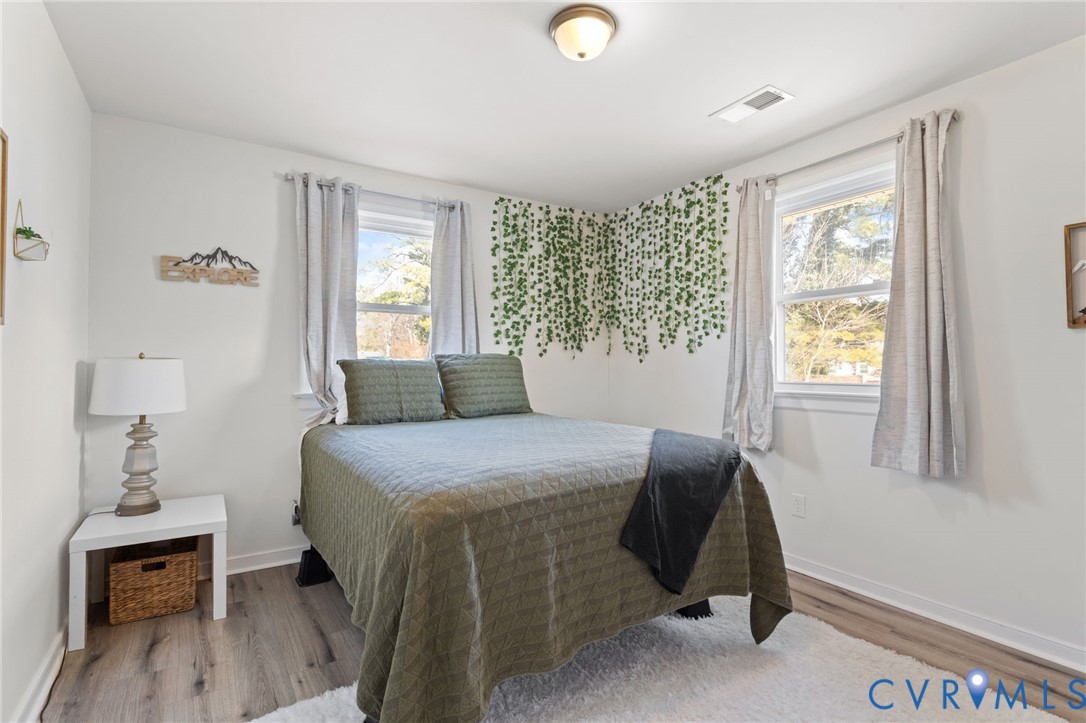7547 Media Park Road Henrico, VA 23231 - Photo 14 of 24 a bedroom with a bed and a window