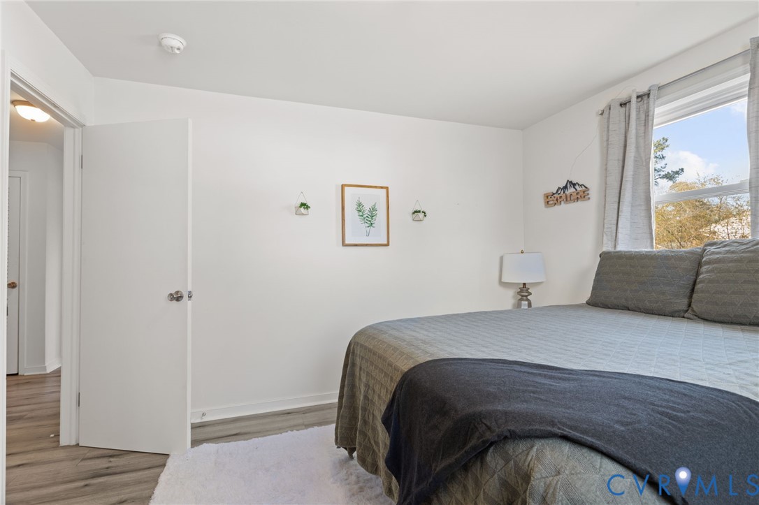 7547 Media Park Road Henrico, VA 23231 - Photo 15 of 24 a bedroom with a bed and a window