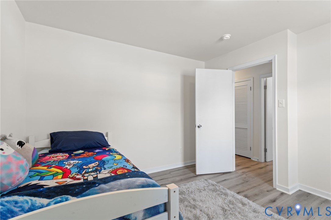 7547 Media Park Road Henrico, VA 23231 - Photo 19 of 24 a room with toys and wooden floor