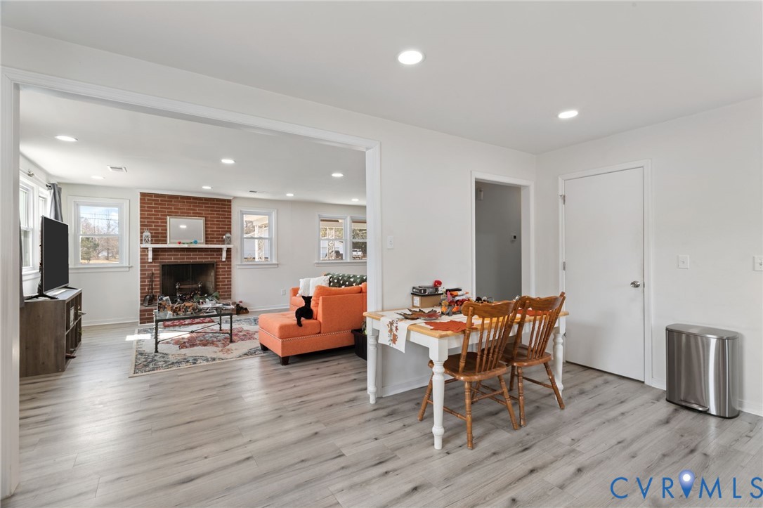 7547 Media Park Road Henrico, VA 23231 - Photo 8 of 24 a living room with furniture and wooden floor