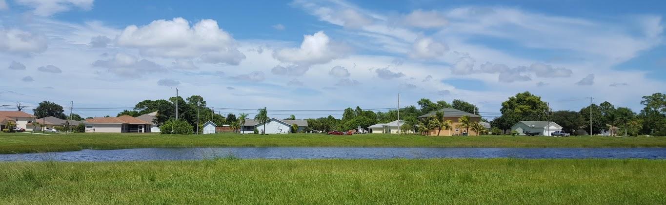 2558 Southwest Fair Isle Road Port St. Lucie, FL 34987 - Photo 2 of 33 Front.Lake View