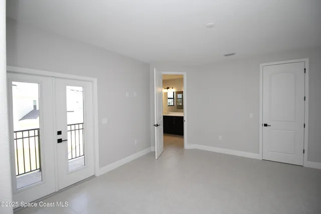 an empty room with windows