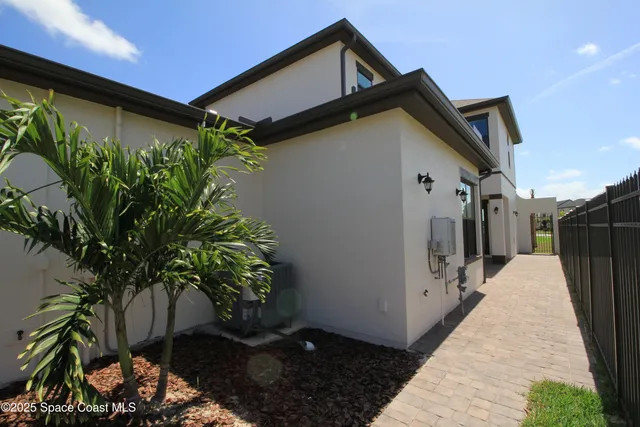 a backyard of a house with lots of green space