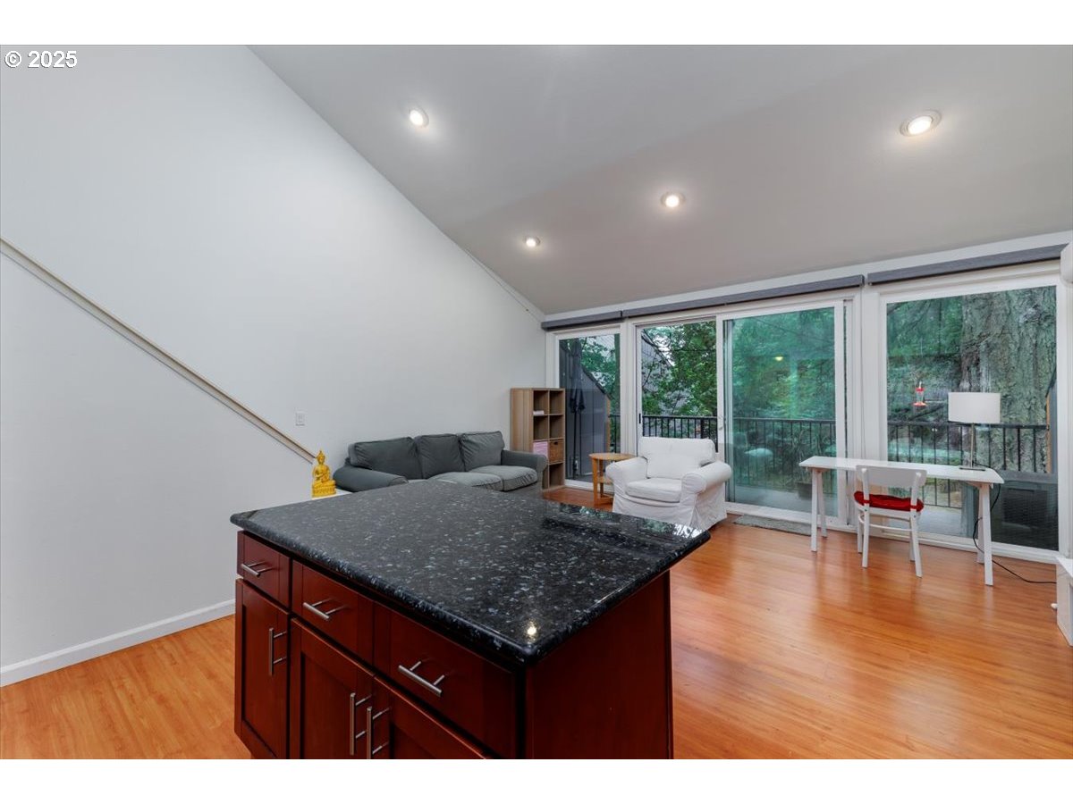 100 Kerr Parkway, Unit 34 Lake Oswego, OR 97035 - Photo 13 of 35 a living room with furniture and a table