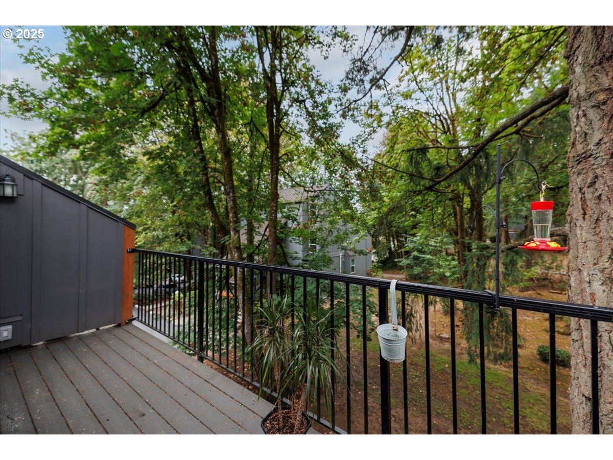 100 Kerr Parkway, Unit 34 Lake Oswego, OR 97035 - Photo 16 of 35 a view of balcony with wooden floor and fence