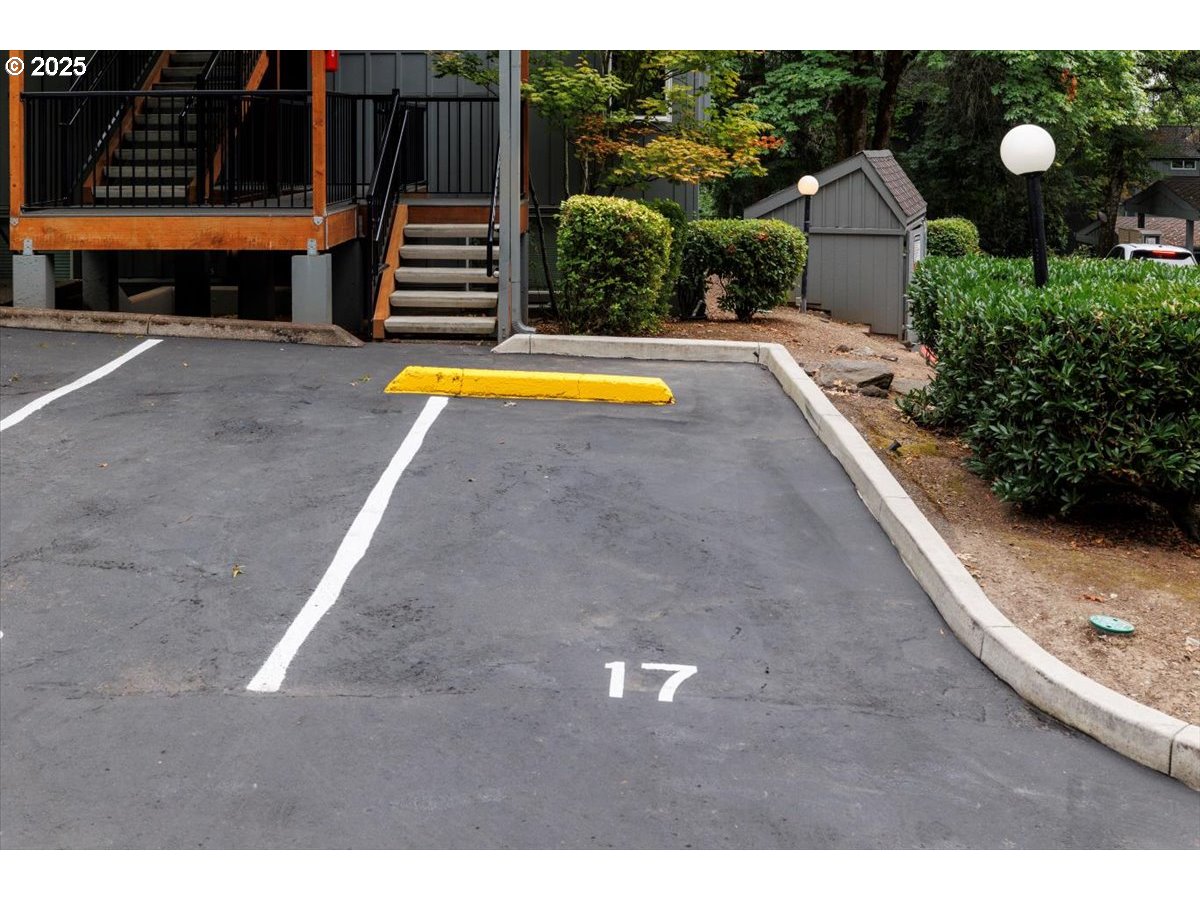 100 Kerr Parkway, Unit 34 Lake Oswego, OR 97035 - Photo 28 of 35 a view of a backyard with swimming pool