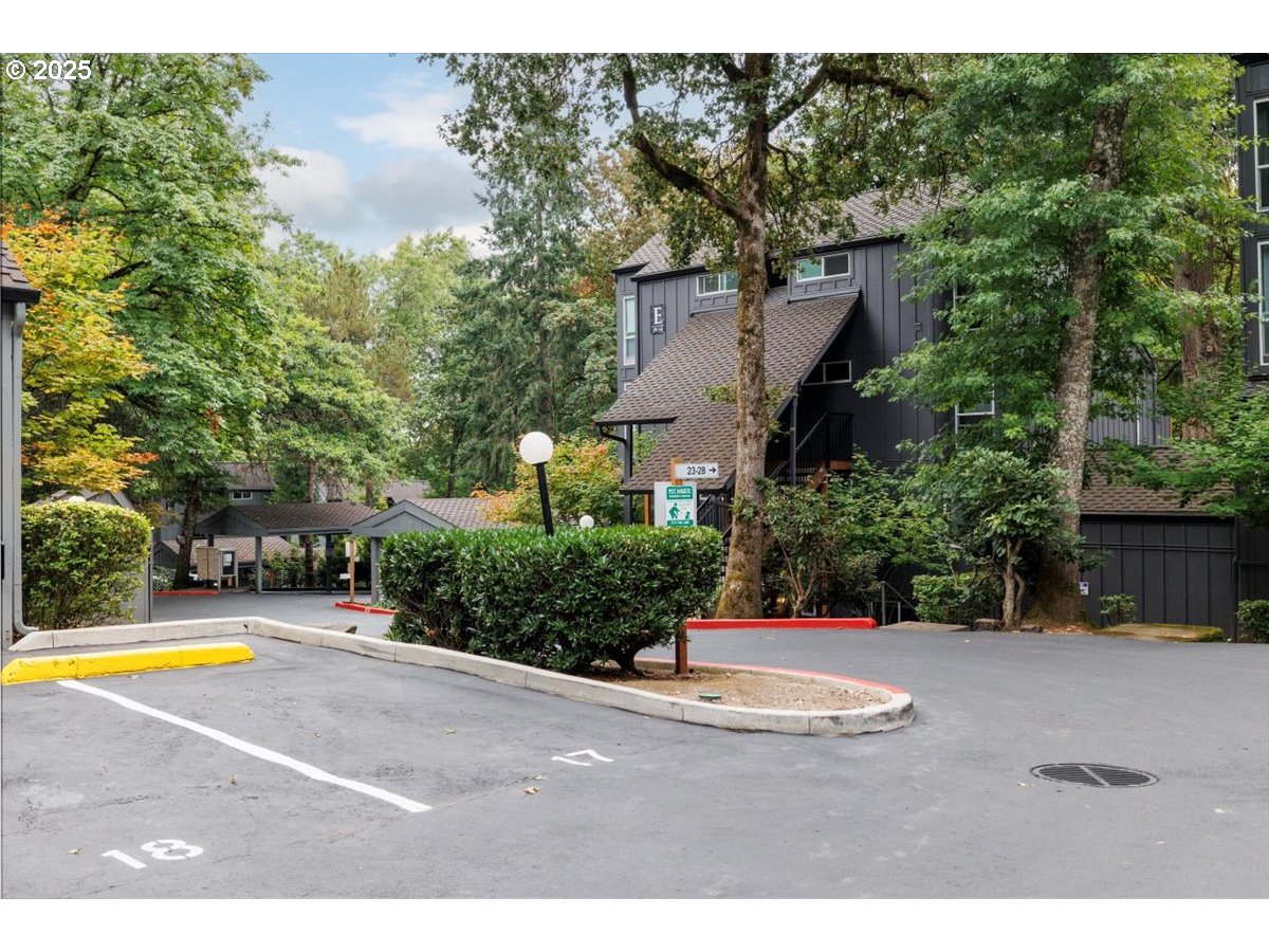 100 Kerr Parkway, Unit 34 Lake Oswego, OR 97035 - Photo 29 of 35 a view of a house with a swimming pool