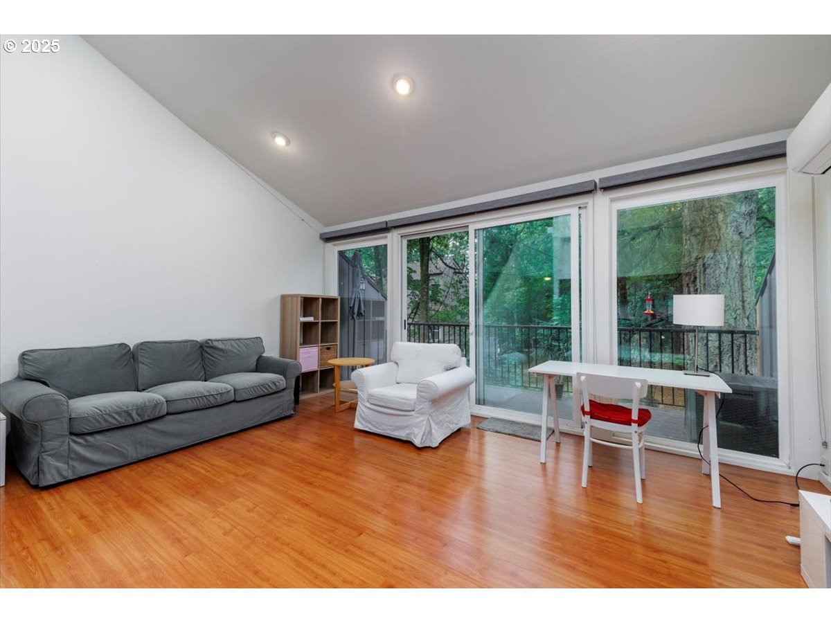 100 Kerr Parkway, Unit 34 Lake Oswego, OR 97035 - Photo 7 of 35 a living room with furniture and a large window