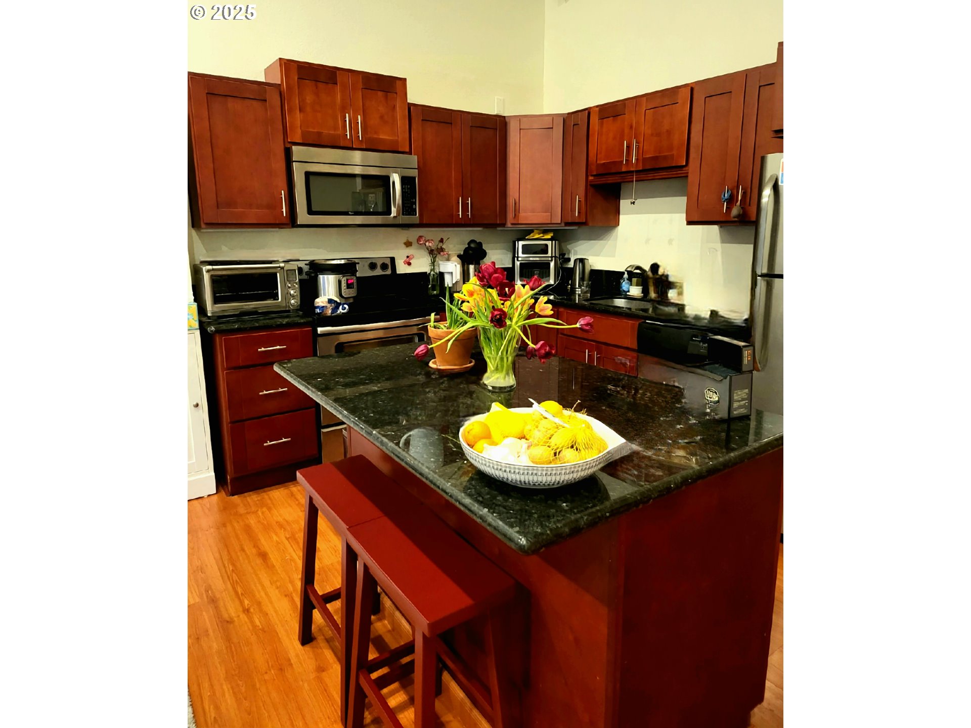 100 Kerr Parkway, Unit 34 Lake Oswego, OR 97035 - Photo 10 of 35 a kitchen with a sink and a microwave