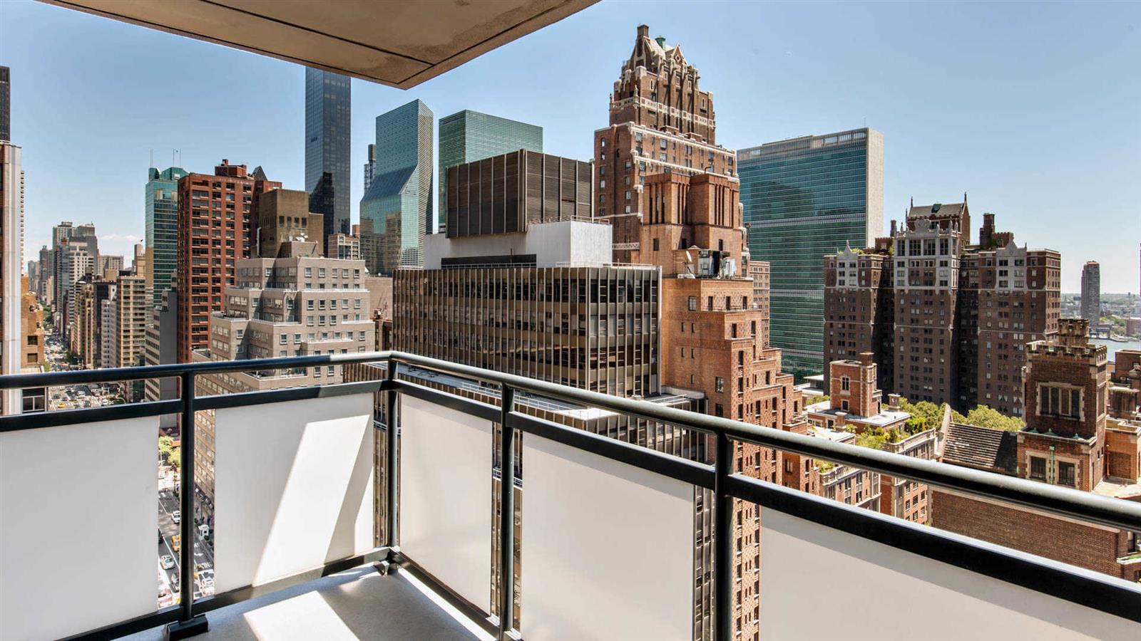 245 East 40th Street, Unit 24J Manhattan, NY 10016 - Photo 5 of 10 a view of a city from a balcony