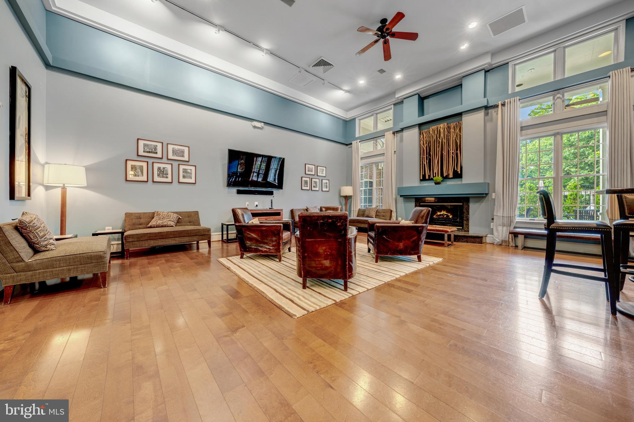 1925 Logan Manor Drive Reston, VA 20190 - Photo 51 of 61 a living room with furniture window and wooden floor
