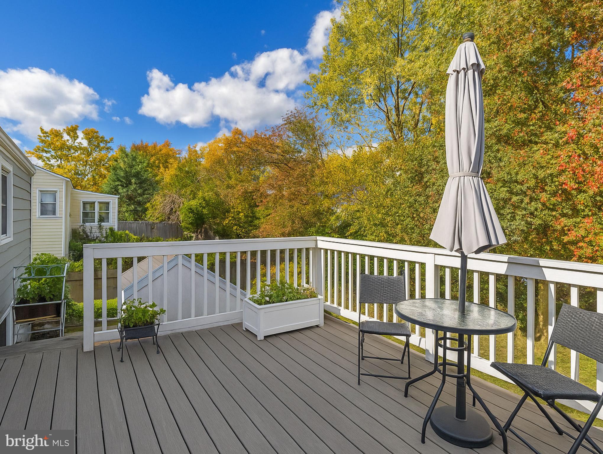 7314 Powhatan Street Lanham, MD 20706 - Photo 5 of 19 a view of a chairs on the roof deck