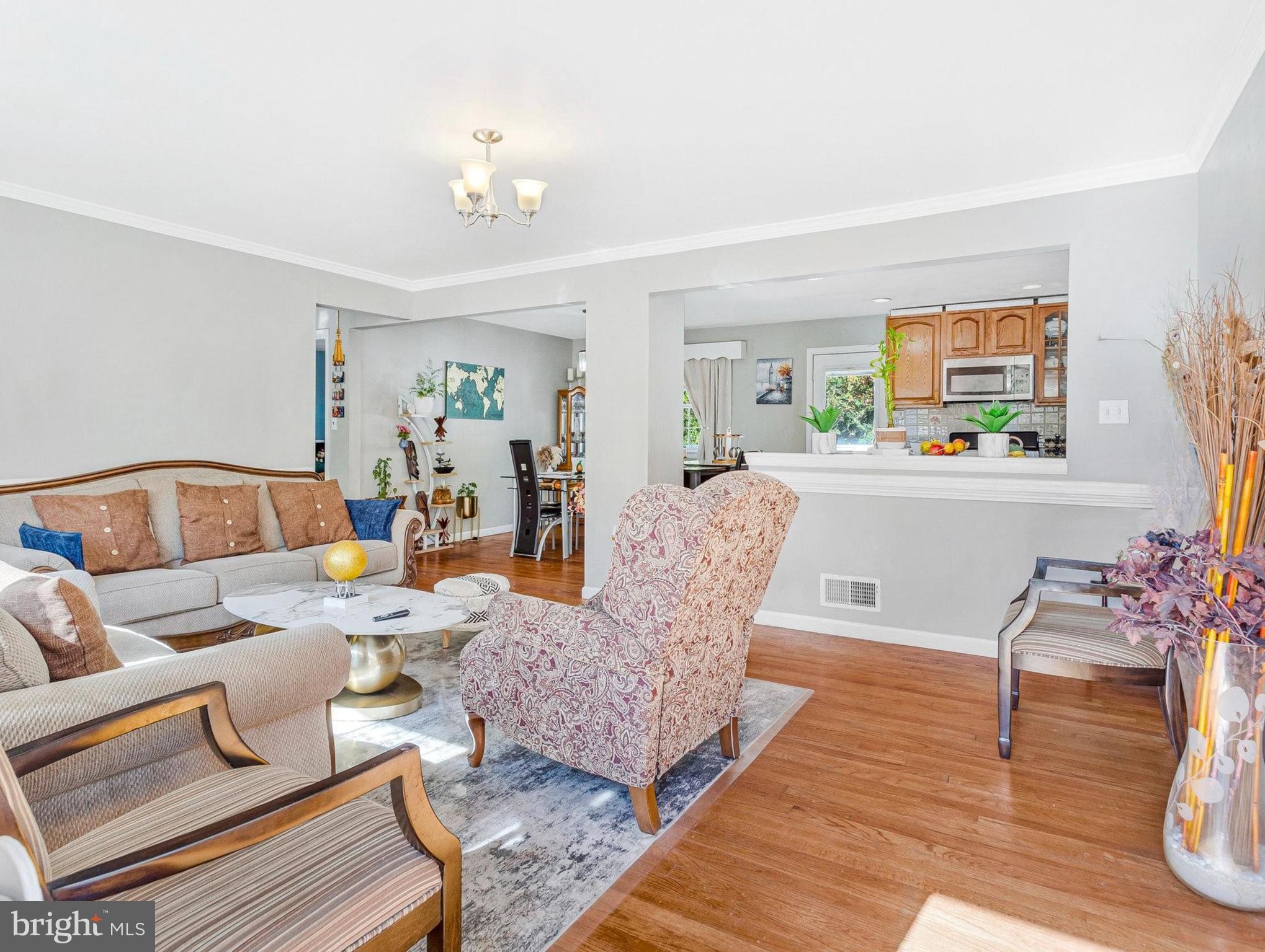 7314 Powhatan Street Lanham, MD 20706 - Photo 7 of 19 a living room with furniture and wooden floor