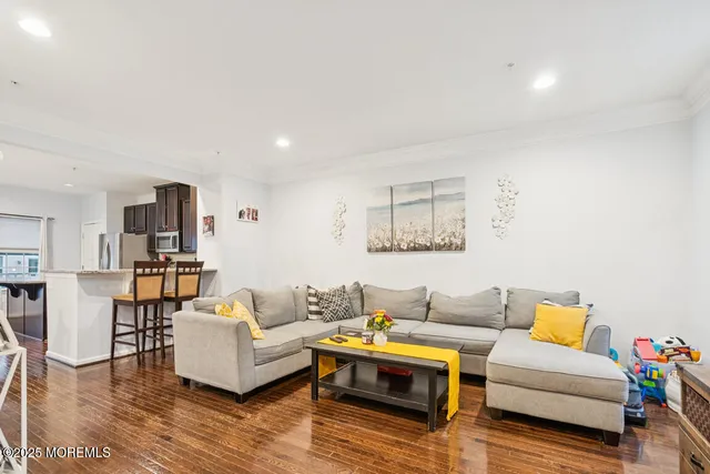 a living room with furniture and a table