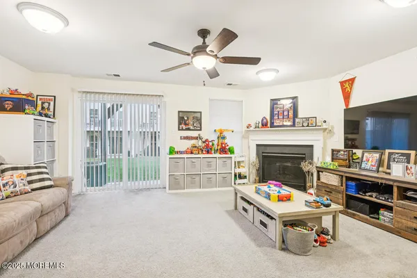 a bed room with furniture and a fireplace
