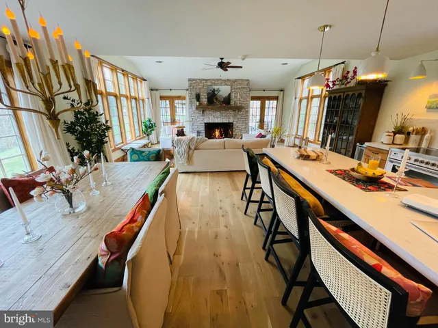 a living room with furniture and a table