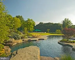 a view of a golf course with a lake