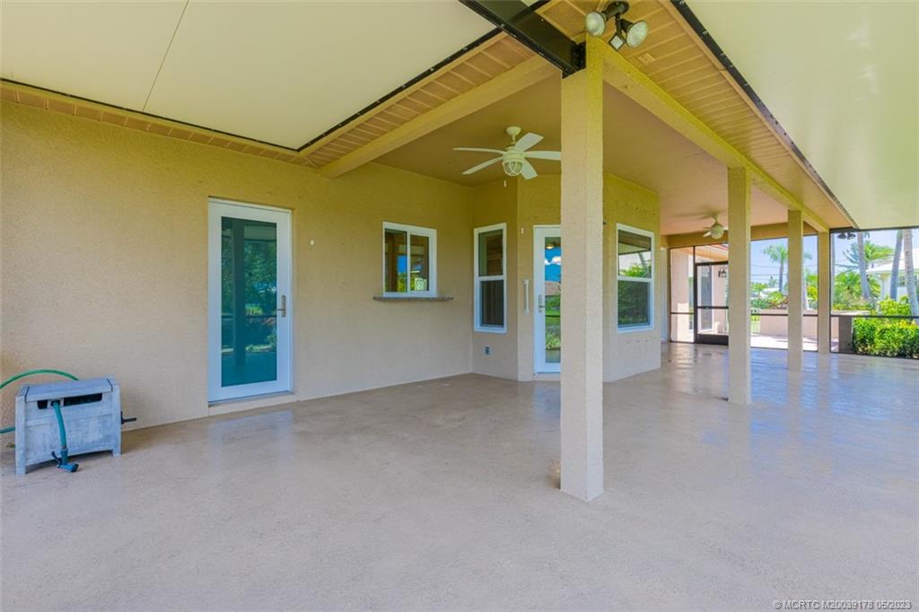 2642 Northwest S Shore Road Stuart, FL 34994 - Photo 26 of 40 a view of an empty room with glass door