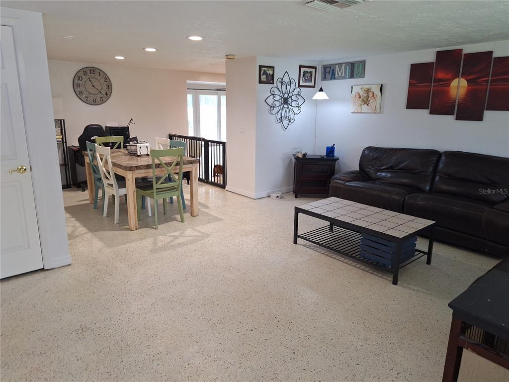 9415 Indale Drive New Port Richey, FL 34654 - Photo 14 of 93 a living room with furniture and a large window