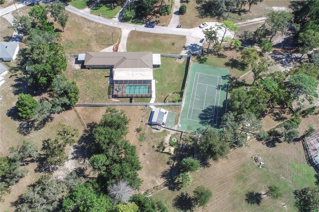 9415 Indale Drive New Port Richey, FL 34654 - Photo 56 of 93 an aerial view of a house with a yard
