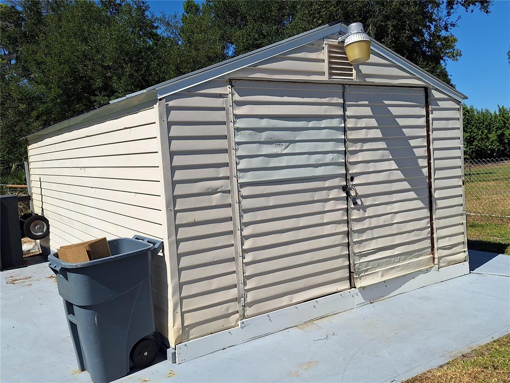 9415 Indale Drive New Port Richey, FL 34654 - Photo 61 of 93 a front view of a house with a yard