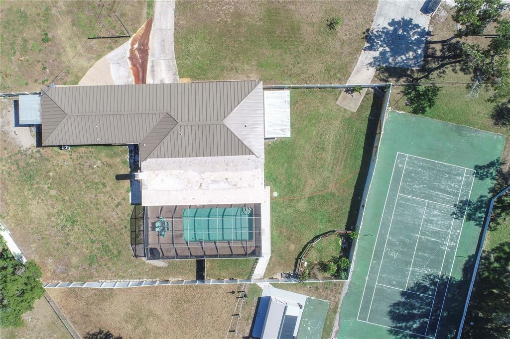 9415 Indale Drive New Port Richey, FL 34654 - Photo 91 of 93 a bathroom with a sink and mirror