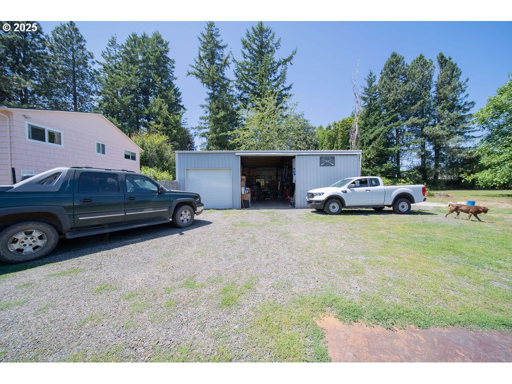 3689 Southeast 14th Street Gresham, OR 97080 - Photo 28 of 35 a car parked in front of a house