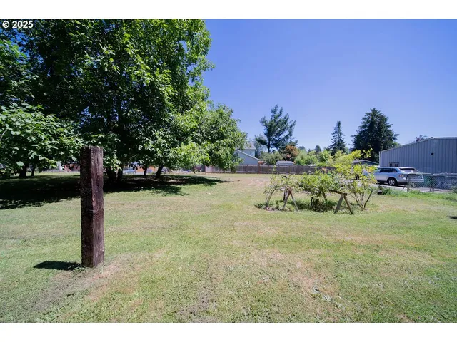 a view of street with parked cars