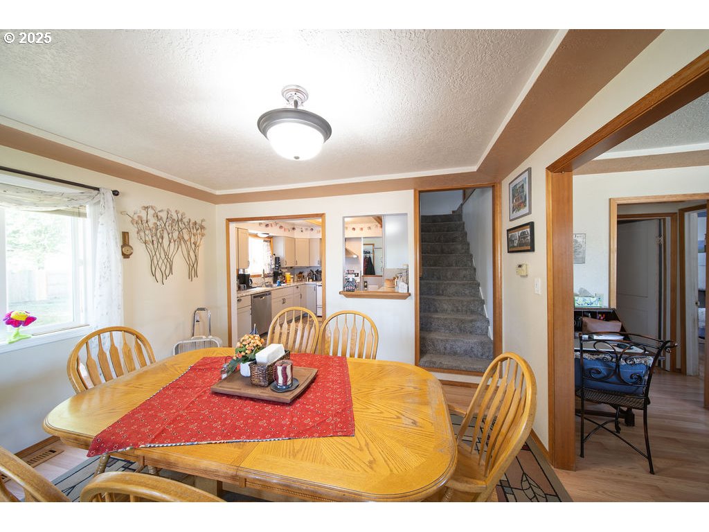 3689 Southeast 14th Street Gresham, OR 97080 - Photo 8 of 35 a bedroom with furniture and wooden floor
