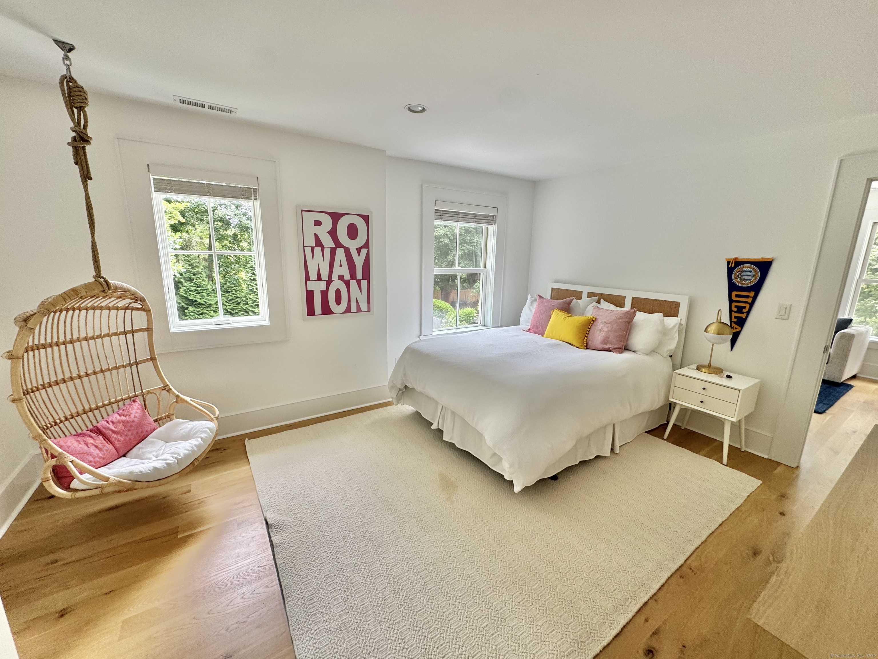 18 Englewood Road Norwalk, CT 06853 - Photo 22 of 25 a bedroom with a bed and a window