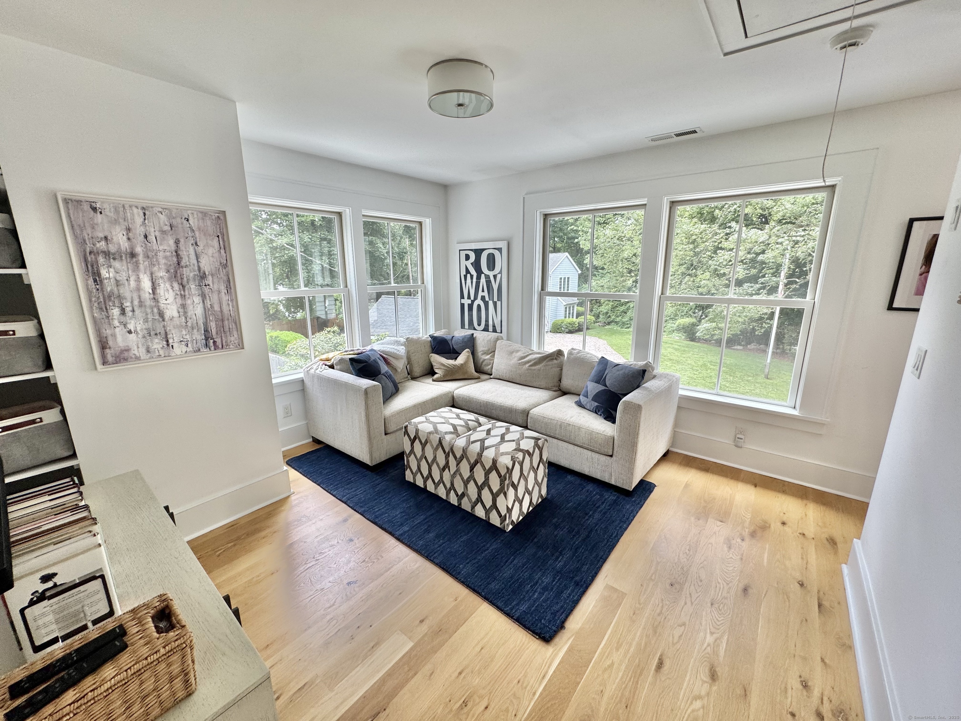 18 Englewood Road Norwalk, CT 06853 - Photo 23 of 25 a living room with furniture and a large window