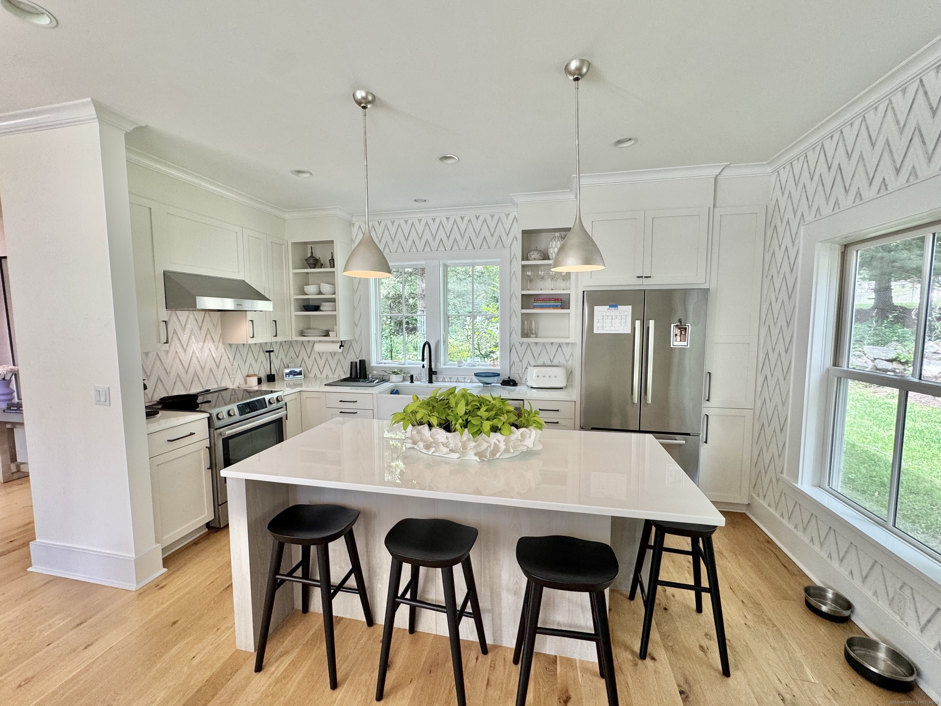 18 Englewood Road Norwalk, CT 06853 - Photo 7 of 25 a view of a dining room and livingroom view
