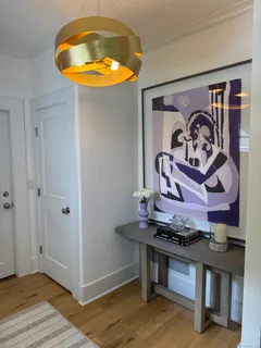 a view of a livingroom with furniture