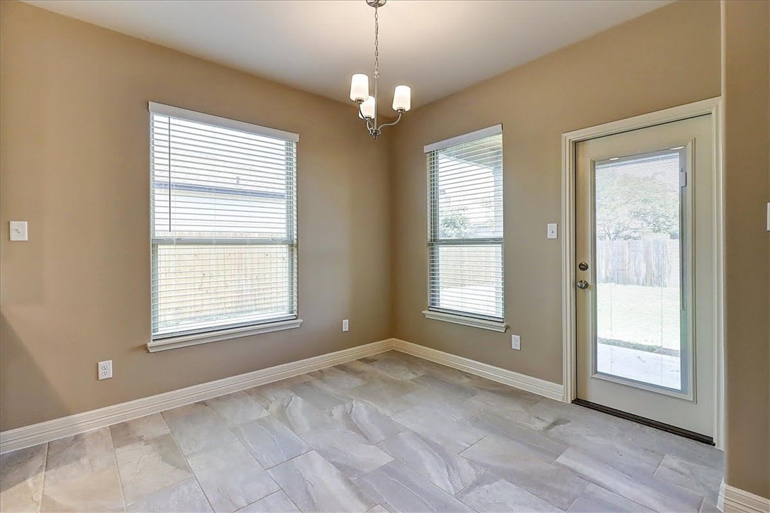 3153 Seawolf Corpus Christi, TX 78414 - Photo 18 of 40 a view of an empty room with a window