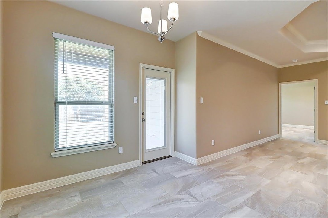 3153 Seawolf Corpus Christi, TX 78414 - Photo 19 of 40 a view of an empty room with a window