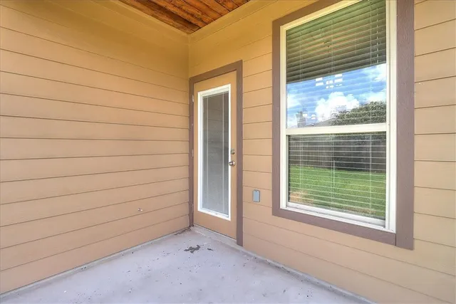 a view of a house with a large window