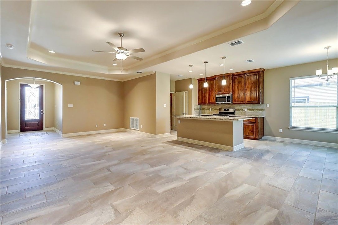 3153 Seawolf Corpus Christi, TX 78414 - Photo 8 of 40 a view of a kitchen with a sink and a stove
