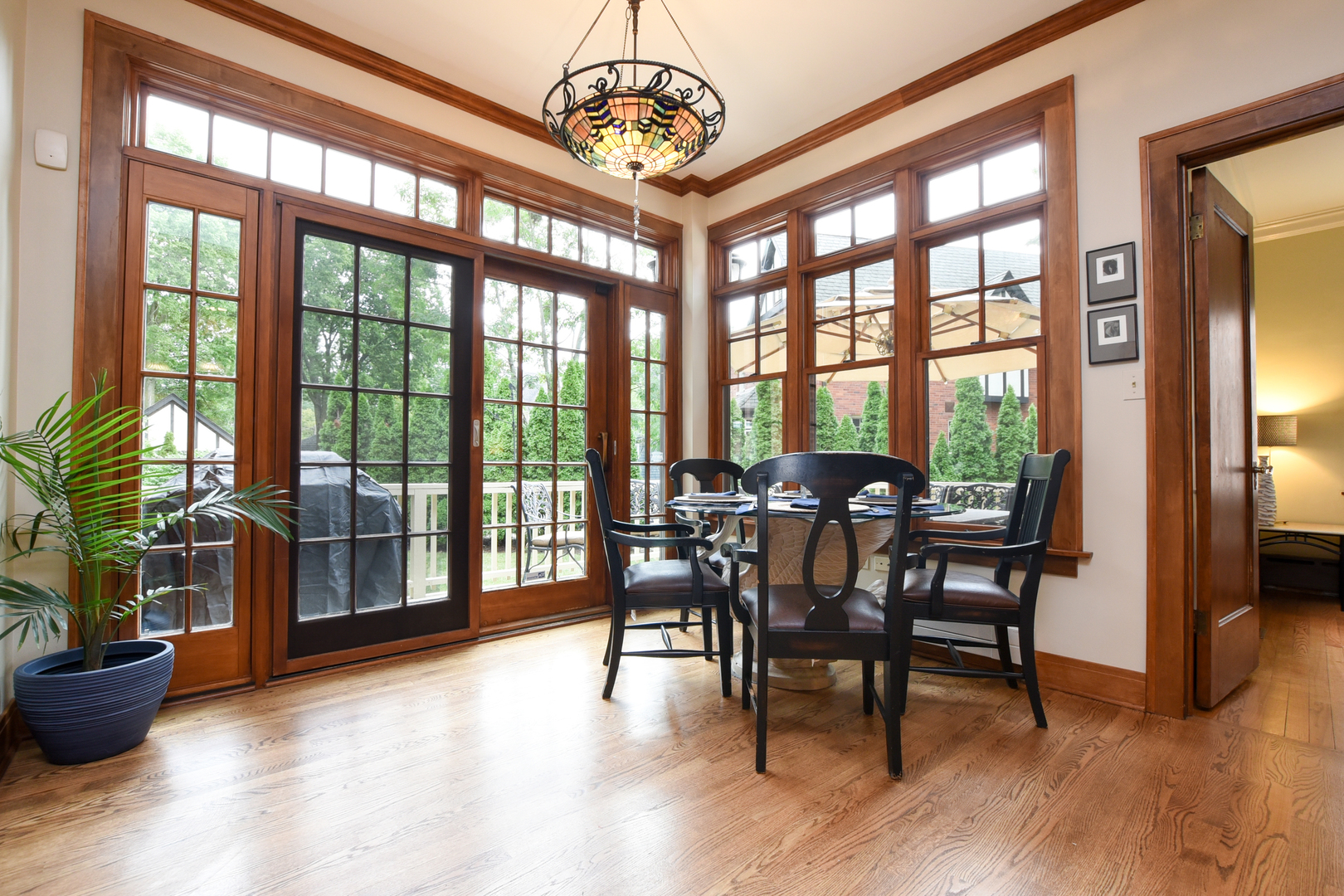 95 Michaux Road Riverside, IL 60546 - Photo 21 of 48 a view of a dining room with furniture window and wooden floor